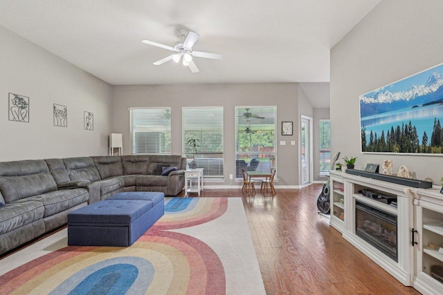 602 Leisurewoods Dr, Buda, TX 78610 - living area with ceiling fan and wood finished floors