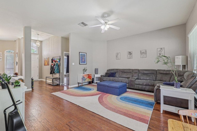602 Leisurewoods Dr, Buda, TX 78610 - living room featuring ceiling fan, wood finished floors, and baseboards