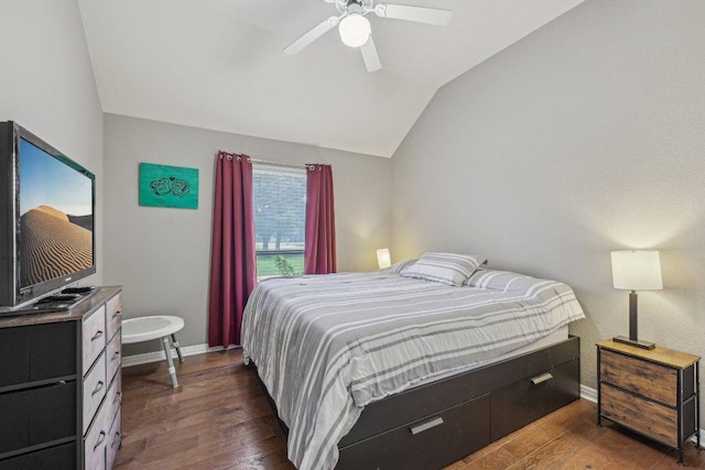 602 Leisurewoods Dr, Buda, TX 78610 - bedroom with lofted ceiling, baseboards, wood finished floors, and ceiling fan