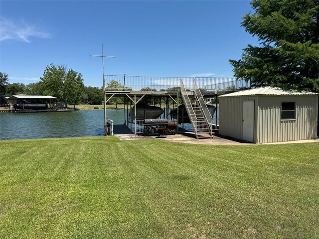 304 E Pheasant Rd, Highland Haven, TX 78654 - dock featuring a lawn, a water view, boat lift, and stairway