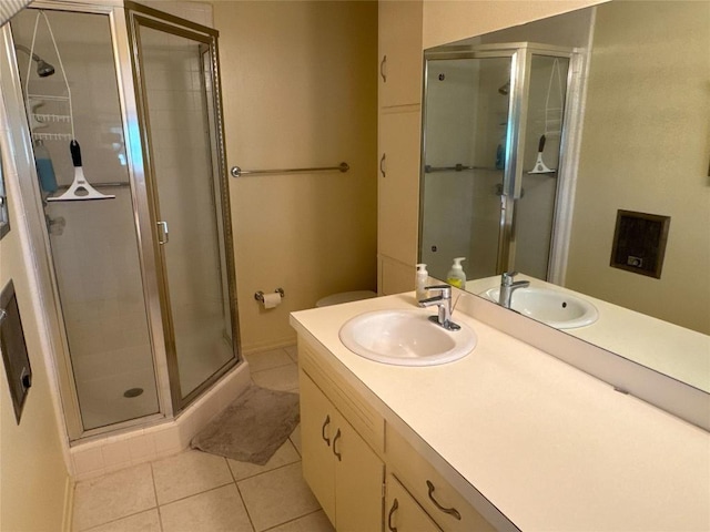 304 E Pheasant Rd, Highland Haven, TX 78654 - bathroom with tile patterned floors, a stall shower, and vanity