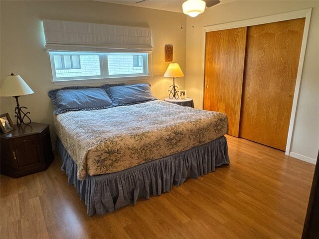 304 E Pheasant Rd, Highland Haven, TX 78654 - bedroom featuring wood finished floors, a closet, a ceiling fan, and baseboards