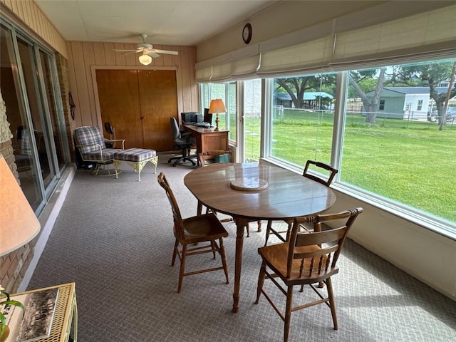304 E Pheasant Rd, Highland Haven, TX 78654 - sunroom featuring carpet, ceiling fan, and wooden walls
