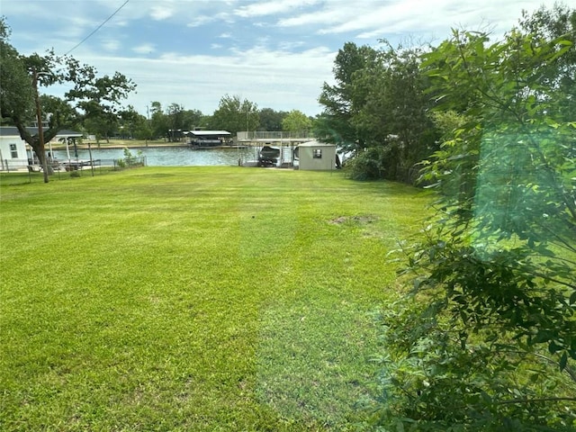 304 E Pheasant Rd, Highland Haven, TX 78654 - view of grassy yard with a water view
