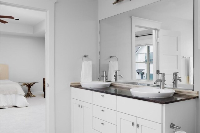 5607 Roosevelt Ave, Austin, TX 78756 - full bathroom featuring double vanity, ceiling fan, and ensuite bath