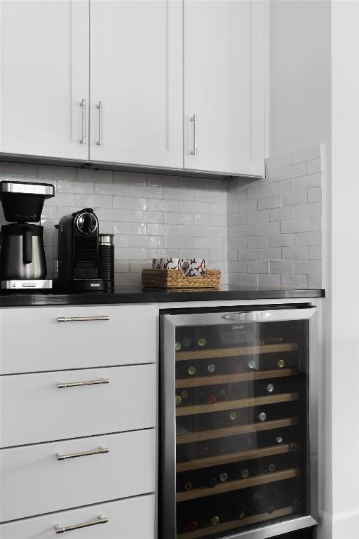5607 Roosevelt Ave, Austin, TX 78756 - indoor dry bar featuring wine cooler and backsplash