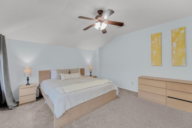 bedroom with vaulted ceiling, carpet, and ceiling fan