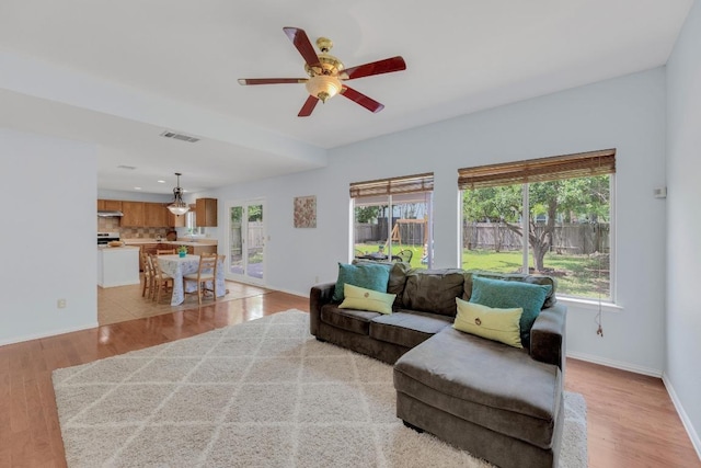 16914 Dorman Dr, Round Rock, TX 78681 - living room with a ceiling fan and light wood-type flooring