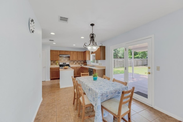 16914 Dorman Dr, Round Rock, TX 78681 - dining space with light tile patterned floors and recessed lighting