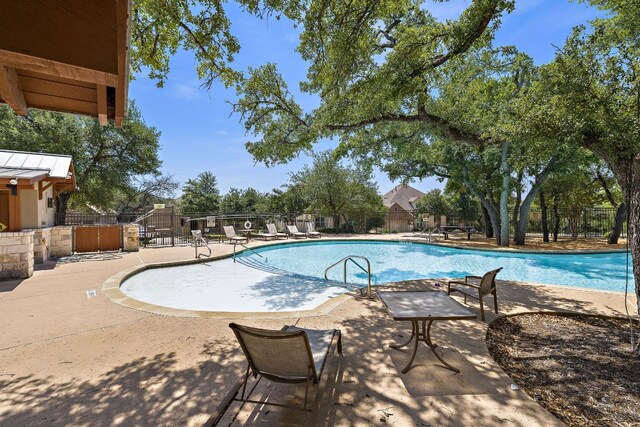 8317 Turning Trl, Austin, TX 78737 - community pool with fence and a patio area