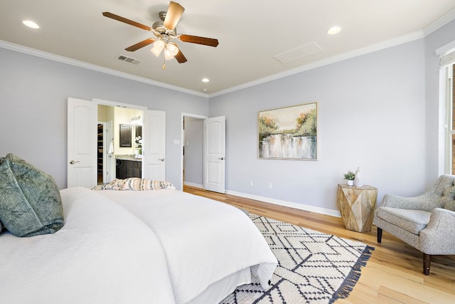 8317 Turning Trl, Austin, TX 78737 - bedroom featuring light wood-style flooring, recessed lighting, baseboards, ornamental molding, and ensuite bathroom