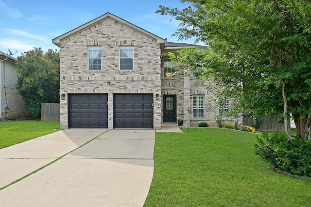 605 Galway Bay Cv, Pflugerville, TX 78660 - view of front of house featuring driveway, a garage, and brick siding