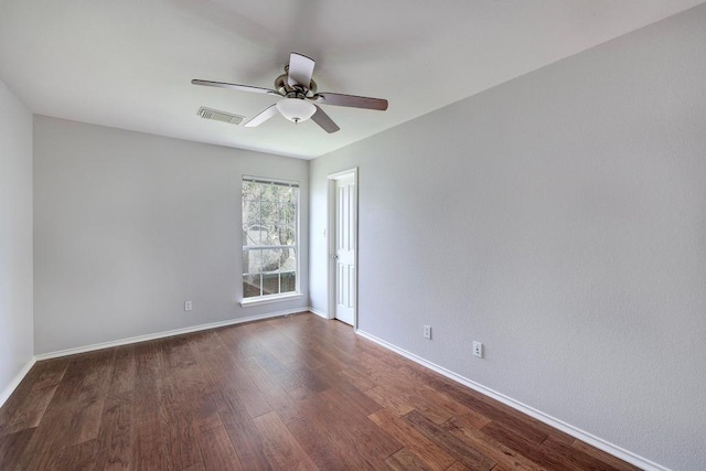 3831 Epperson Trl, Austin, TX 78732 - unfurnished room featuring ceiling fan, dark wood-style flooring, and baseboards