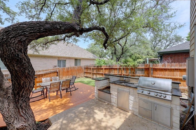 3831 Epperson Trl, Austin, TX 78732 - view of patio featuring a fenced backyard, area for grilling, a deck, and outdoor dining space