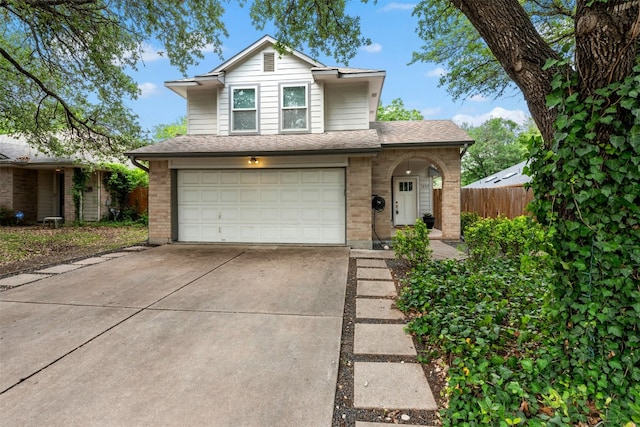 1202 Haverford Dr, Austin, TX 78753 - traditional-style home featuring a garage, brick siding, concrete driveway, fence, and roof with shingles