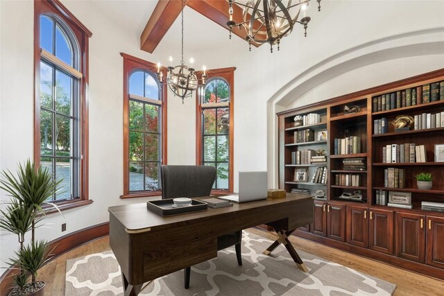 16010 Canard Cir, Austin, TX 78734 - office with a chandelier, light wood-style flooring, and beam ceiling