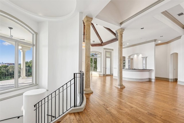 16010 Canard Cir, Austin, TX 78734 - hall with decorative columns, light wood-type flooring, ornamental molding, an upstairs landing, and recessed lighting