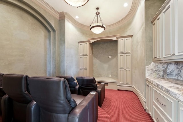 16010 Canard Cir, Austin, TX 78734 - home theater room with crown molding, dark colored carpet, and arched walkways
