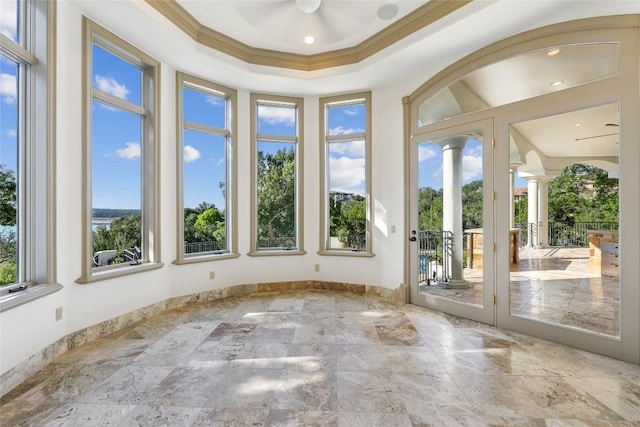 16010 Canard Cir, Austin, TX 78734 - spare room with decorative columns, ornamental molding, and stone finish flooring