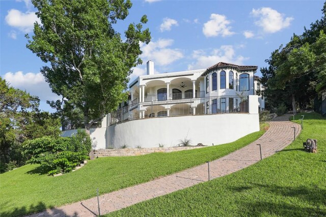 16010 Canard Cir, Austin, TX 78734 - view of front of property with a front lawn, a porch, and stucco siding