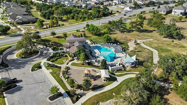 321 Millard St, Georgetown, TX 78628 - aerial view of property's location with a pool area and nearby suburban area