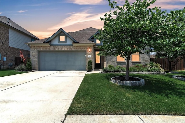 321 Millard St, Georgetown, TX 78628 - view of front of property with a garage and concrete driveway