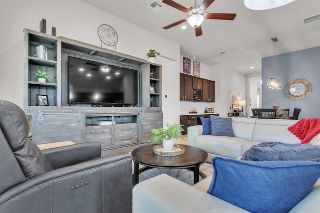 321 Millard St, Georgetown, TX 78628 - living room featuring a ceiling fan and recessed lighting