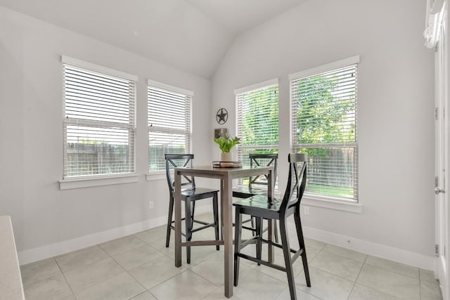 321 Millard St, Georgetown, TX 78628 - dining room with lofted ceiling and light tile patterned floors