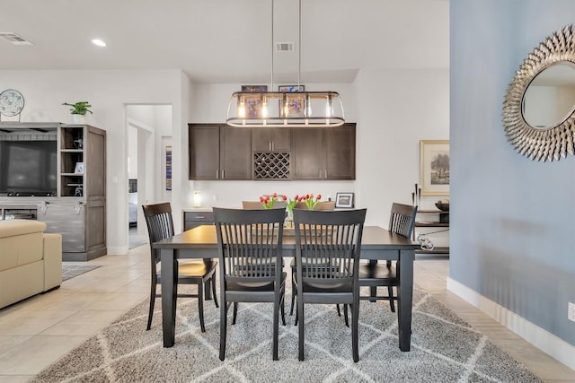 321 Millard St, Georgetown, TX 78628 - dining area featuring light tile patterned flooring and recessed lighting