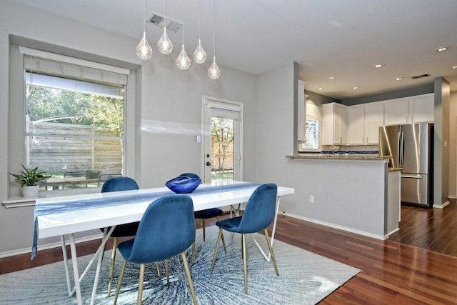 10312 Laredo Dr Unit 165, Austin, TX 78748 - dining room with plenty of natural light, dark wood-type flooring, baseboards, and recessed lighting