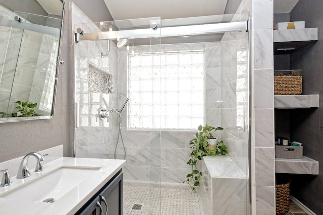 10312 Laredo Dr Unit 165, Austin, TX 78748 - bathroom featuring tiled shower and vanity