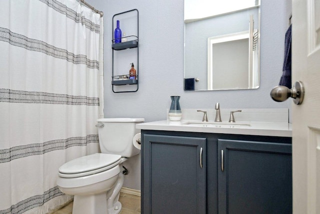 10312 Laredo Dr Unit 165, Austin, TX 78748 - bathroom with toilet, vanity, a shower with shower curtain, and tile patterned floors