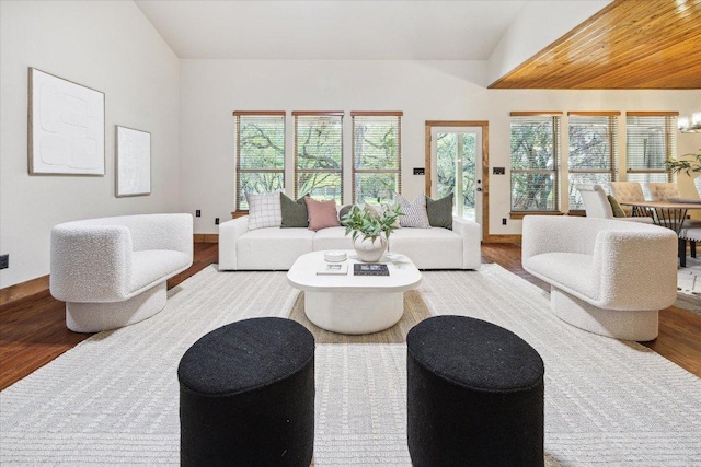 20603 Ridgeview Rd, Lago Vista, TX 78645 - living room with wood finished floors, vaulted ceiling, and a chandelier