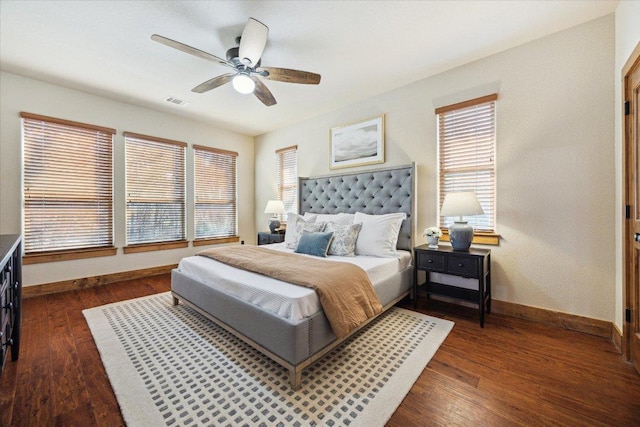 20603 Ridgeview Rd, Lago Vista, TX 78645 - bedroom with dark wood finished floors and a ceiling fan