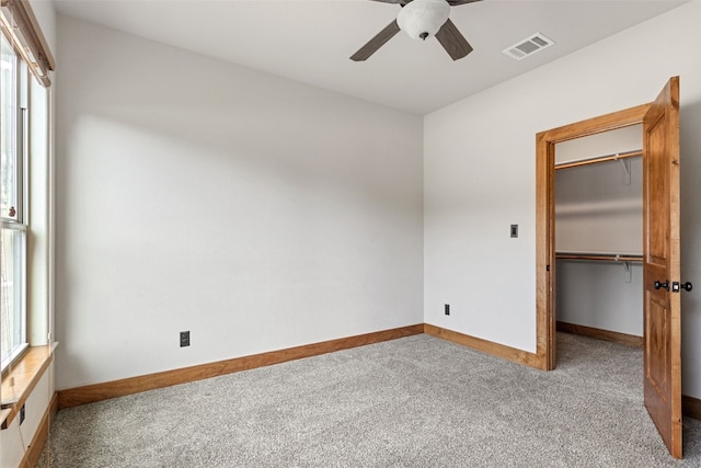20603 Ridgeview Rd, Lago Vista, TX 78645 - unfurnished bedroom with carpet, multiple windows, and a spacious closet