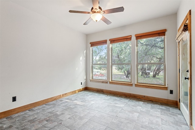 20603 Ridgeview Rd, Lago Vista, TX 78645 - empty room with stone finish floors and ceiling fan