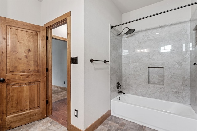 20603 Ridgeview Rd, Lago Vista, TX 78645 - bathroom featuring washtub / shower combination and baseboards