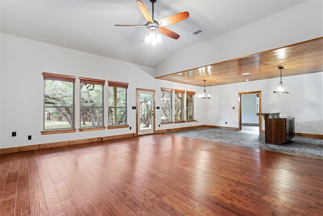 20603 Ridgeview Rd, Lago Vista, TX 78645 - unfurnished living room with hardwood / wood-style flooring, a chandelier, a ceiling fan, and lofted ceiling