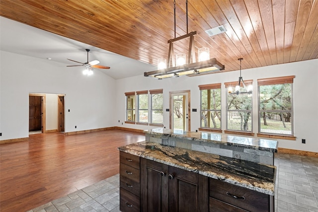 20603 Ridgeview Rd, Lago Vista, TX 78645 - kitchen with vaulted ceiling, wood ceiling, plenty of natural light, decorative light fixtures, and a ceiling fan