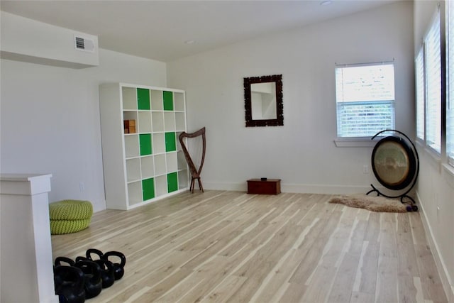 24701 Martin Ln, Spicewood, TX 78669 - exercise area with wood finished floors