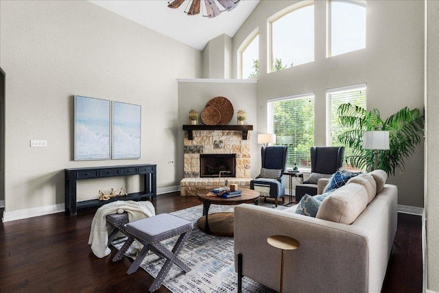5517 Brady Bayou Cv, Austin, TX 78738 - living room with high vaulted ceiling, a fireplace, and wood finished floors