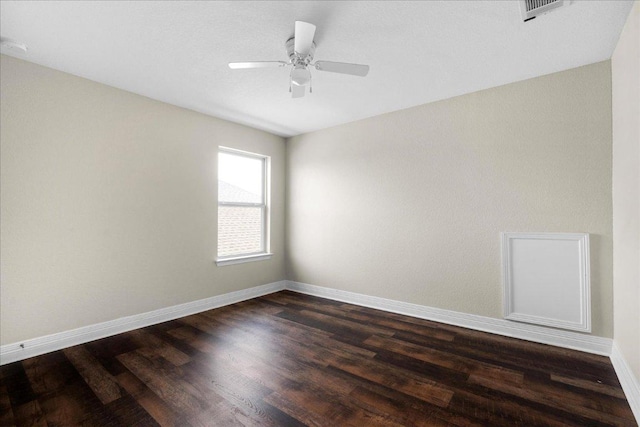 5517 Brady Bayou Cv, Austin, TX 78738 - empty room with dark wood-type flooring and a ceiling fan