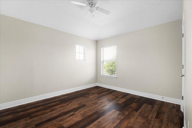5517 Brady Bayou Cv, Austin, TX 78738 - empty room featuring dark wood-type flooring and a ceiling fan