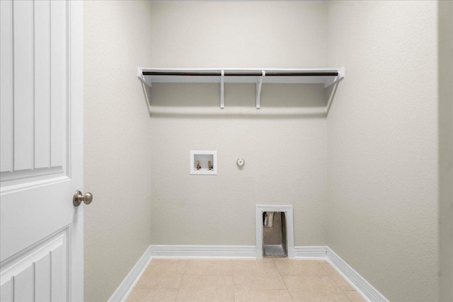 5517 Brady Bayou Cv, Austin, TX 78738 - washroom featuring gas dryer hookup, washer hookup, tile patterned flooring, and hookup for an electric dryer