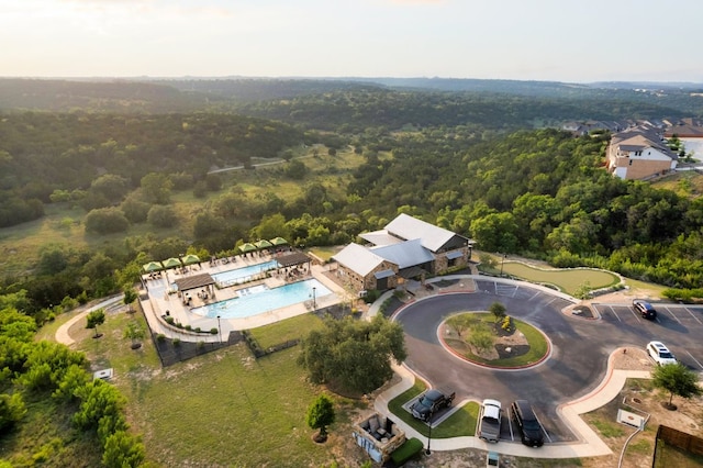 5517 Brady Bayou Cv, Austin, TX 78738 - view of property location featuring a heavily wooded area and a pool