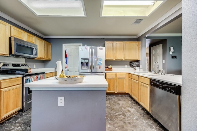 2718 Georgian Dr, Georgetown, TX 78626 - kitchen with stainless steel appliances, a sink, crown molding, and light brown cabinets