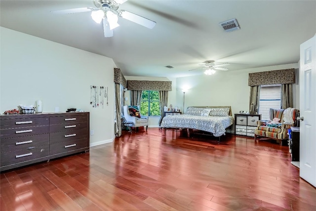 2718 Georgian Dr, Georgetown, TX 78626 - bedroom featuring wood finished floors, baseboards, and a ceiling fan