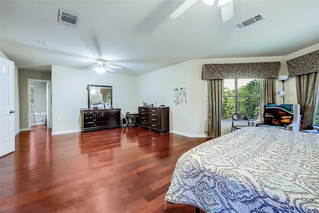 2718 Georgian Dr, Georgetown, TX 78626 - bedroom with wood finished floors, baseboards, and ceiling fan
