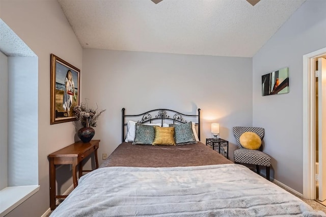 11901 Swearingen Dr Unit 30, Austin, TX 78758 - bedroom featuring vaulted ceiling and a textured ceiling