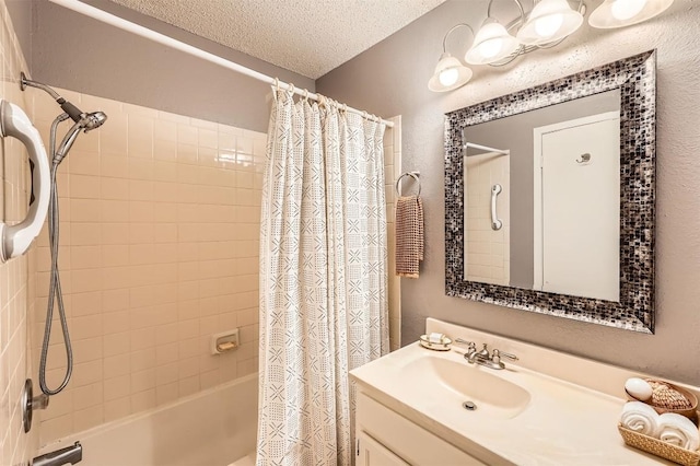 full bath featuring shower / bathtub combination with curtain, a textured ceiling, and vanity